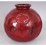 AN UNUSUAL FLAMBE GLAZED & MOULDED STUDIO VASE, possibly Japanese, 7.8in wide at widest point &