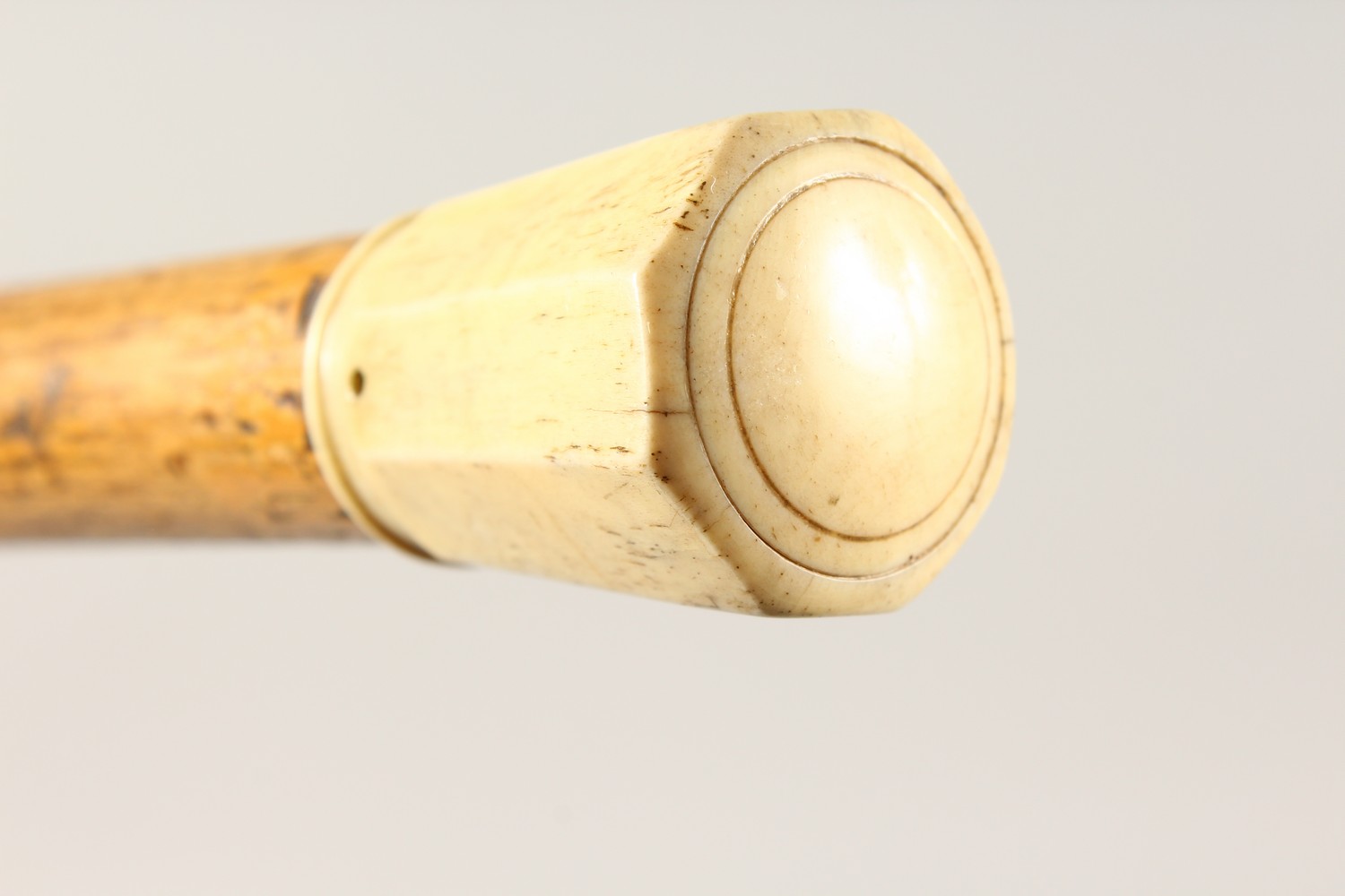 A 19TH CENTURY BAMBOO DAGGER CANE, with ivory pommel. 37ins long. - Image 3 of 10