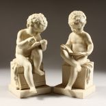 A PAIR OF PARIAN FIGURES OF CUPIDS sitting on a plinth. 12ins high.