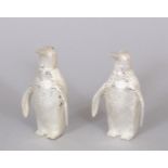 A SMALL PAIR OF PENGUIN SALT AND PEPPERS. 7cms high.