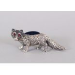 A NOVELTY SILVER FOX PIN CUSHION.