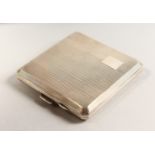 AN ENGINE TURNED SILVER CIGARETTE CASE. 8cms x 8cms. Birmingham 1941.