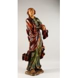 A 17TH-18TH CENTURY ITALIAN CARVED WOOD, GILDED AND PAINTED STANDING FIGURE OF A MONK. 3ft high.