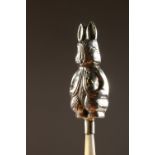 A SILVER AND MOTHER-OF-PEARL RABBIT RATTLE. 12cms long.