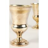 A PAIR OF GEORGE IV THISTLE SHAPED GOBLETS. London 1825. Maker's: John Henry & Chas Lias.