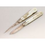 TWO SILVER AND MOTHER-OF-PEARL FRUIT KNIVES. Sheffield 1925 and 1911.