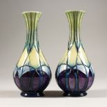 A PAIR OF VASES, with the lattice design, introduced in 1992. 6.5ins high.