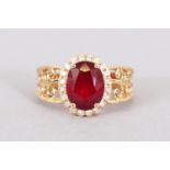 A 14CT YELLOW GOLD AND DIAMOND RING set with an oval cut ruby approx. 3.10cts. Diamonds approx. 0.