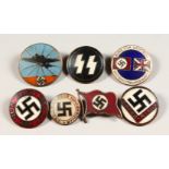 SEVEN VARIOUS NAZI BADGES.