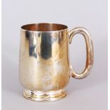 A PLAIN PINT MUG. Birmingham 1939. Weight 6ozs.