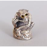 A NOVELTY SILVER WISE MONKEY PIN CUSHION.