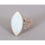 A SILVER AND OPAL RING.