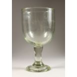 A MAMMOUTH PLAIN GLASS GOBLET. 12.5ins high x 6.5ins diameter.