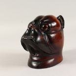 A BLACK FOREST BULLDOG TOBACCO JAR AND COVER.