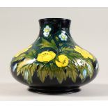 A BULBOUS VASE, with the buttercup design, introduced in 1991. 6.5ins high x 7.5ins diameter.