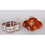 A PAIR OF PLATE AND TORTOISESHELL SHAPED COASTERS.