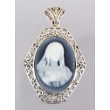 A SILVER AND CAMEO PENDANT.