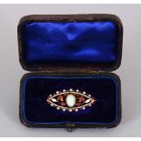 AN EDWARDIAN GOLD, OPAL AND ENAMEL BROOCH.