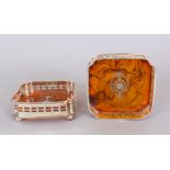 A PAIR OF FAUX TORTOISESHELL AND PLATE SQUARE WINE COASTERS.