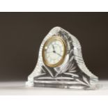 A WATERFORD CUT CRYSTAL CLOCK. 7.5ins long.