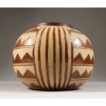 A SIMILAR PERUVIAN POT. 13cms high x 20cms diameter.