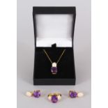 A SILVER AND GOLD PLATED AMETHYST SET RING, PENDANT AND EARRINGS.