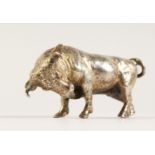 A CAST SILVER MODEL OF A BULL. 7cms long. Stamped .925.
