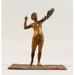 A COLD CAST BRONZE NUDE, with a snake, standing on a carpet. 12.5cms high.