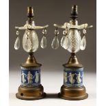 A PAIR OF LUSTRES, with blue and white jasper ware bases. 10.5ins high.