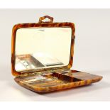 A TORTOISESHELL TRAVELLING VANITY CASE. 6.5ins x 5.5ins.