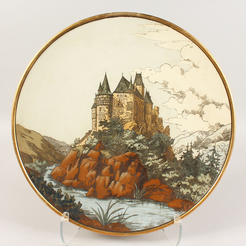 A LARGE CIRCULAR CHARGER with a castle on a rock. Impressed No. 1108. 17ins diameter.