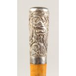 A CHINESE BAMBOO SWORD CANE, the white metal pommel chased with dragons, the bamboo shaft