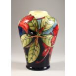 A BULBOUS VASE, with the rainforest design, introduced in 1992.