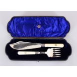 A FISH KNIFE AND FORK, with ivory handles, in a fitted case. Sheffield 1907. Maker: G.H.