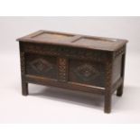 AN 18TH CENTURY OAK DOWER CHEST, two panels to the top, carved frieze and two diamond motifs to