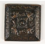 A CHINESE BRONZE SQUARE MIRROR. 11cms.