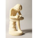 A 19TH CENTURY WHITE MARBLE GROUP OF A BOY picking a thorn from his foot. 8ins high.