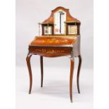 A FRENCH ROSEWOOD, MARQUETRY AND ORMOLU BONHEUR DU JOUR, the upper section with three small