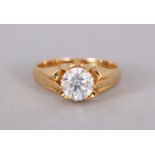 AN 18CT YELLOW GOLD BRILLIANT CUT SINGLE STONE DIAMOND RING of 1.31cts.