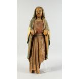 AN EARLY CARVED WOOD FIGURE OF THE MADONNA, for restoration, arms missing. 25ins long.
