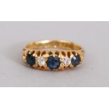 AN 18CT GOLD, DIAMOND AND SAPPHIRE RING.