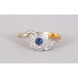 AN 18CT GOLD, DIAMOND AND SAPPHIRE RING.