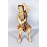 A LARGE 19TH CENTURY ITALIAN CARVED WOOD AND SEATED FIGURE OF A YOUNG MAN. 34ins high.