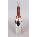 A CHAMPAGNE BOTTLE COCKTAIL SHAKER.