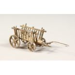 A MINIATURE SILVER HAY CART. London 1898.