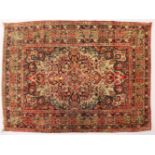 A PERSIAN RUG, with all-over pattern. 5ft 9ins x 4ft 7ins.