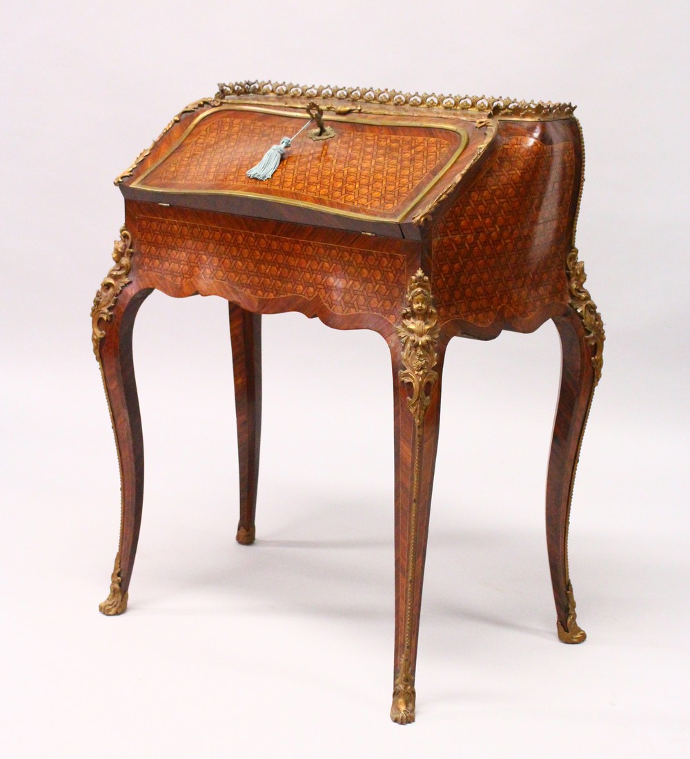 A GOOD 19TH CENTURY FRENCH KINGWOOD, PARQUETRY AND ORMOLU BUREAU, with ornate cast ormolu