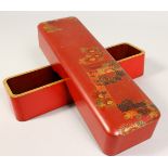 A JAPANESE LACQUER BOX. 10ins long.
