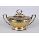 A TWO-HANDLED OVAL TUREEN AND COVER, with key pattern decoration.