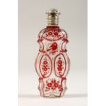 A VICTORIAN RUBY DECORATED SILVER TOP SCENT BOTTLE. 11cms long.